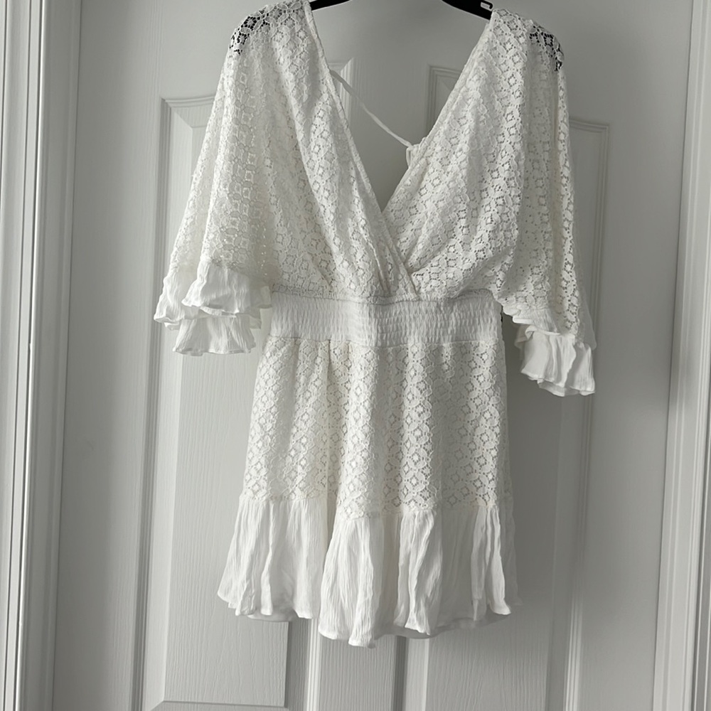 White lace short dress with shorts underneath.